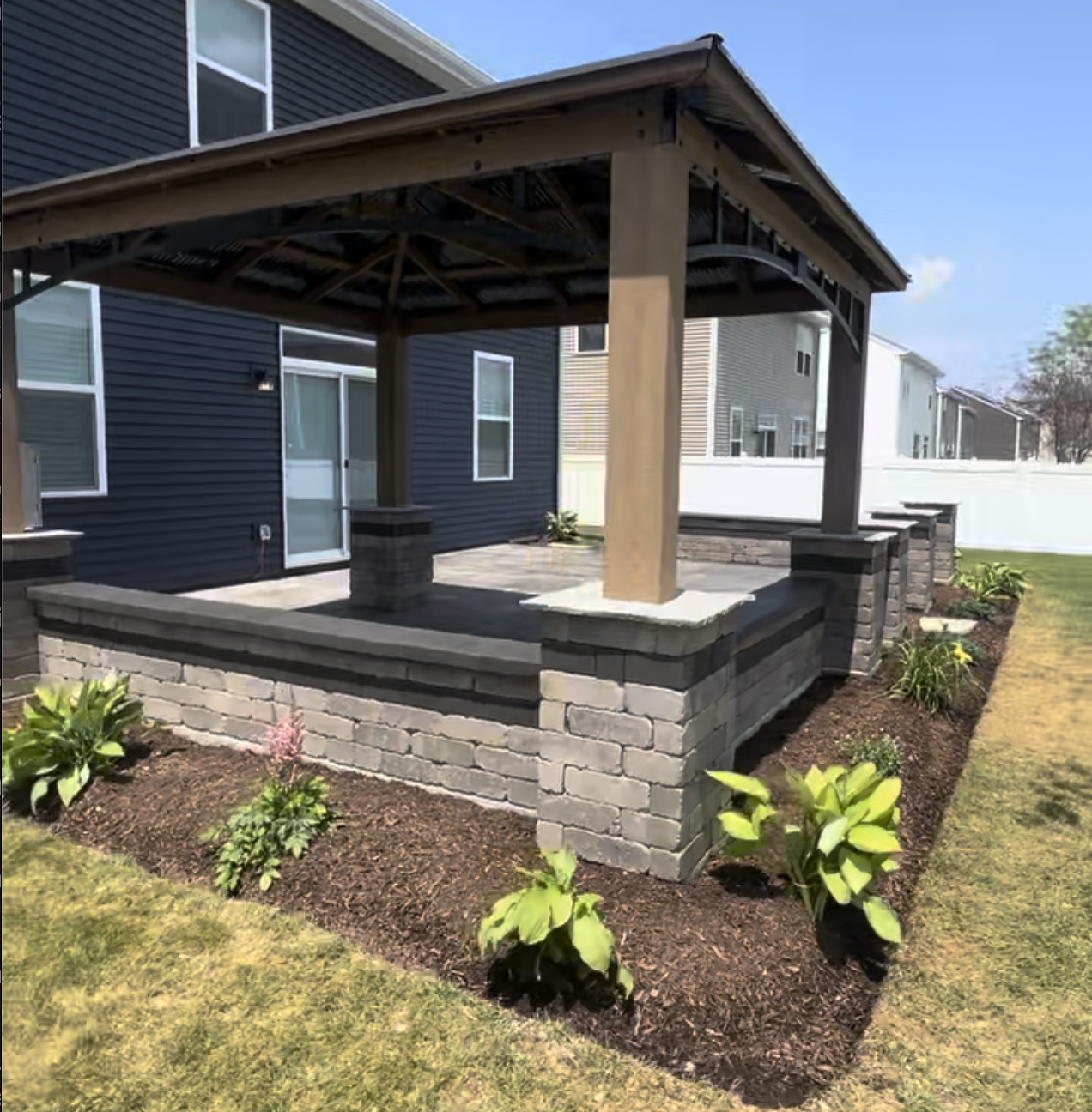 Residential backyard concrete patio project by PFS Concrete & Asphalt